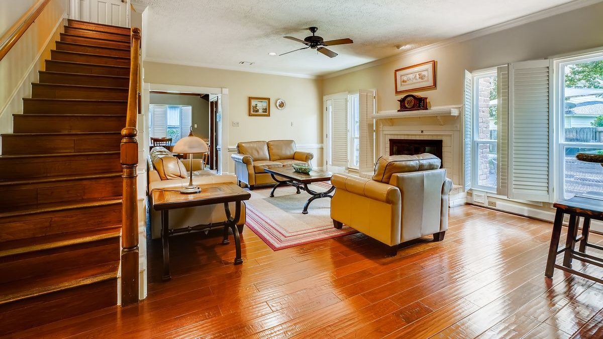 A warm home living room with a staircase, the kind aging-in-place modifications adapt