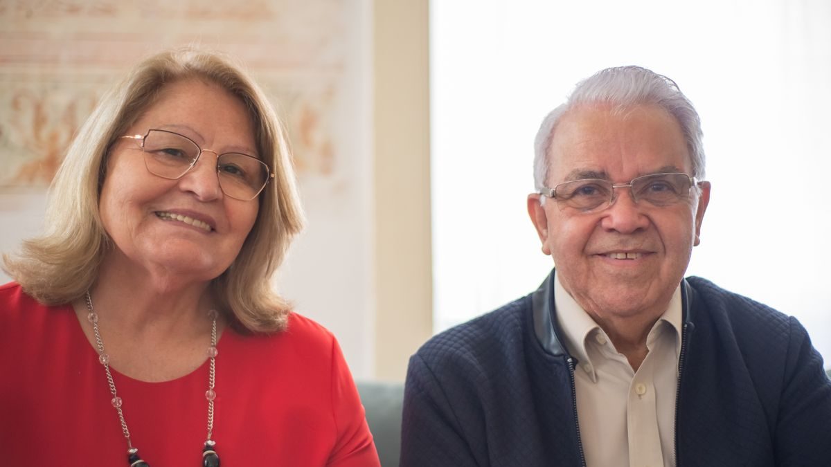 An older couple at home together, weighing what staying in their own home means